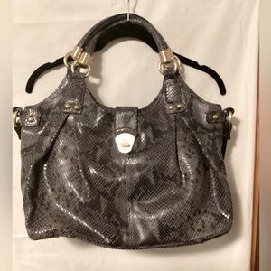 Reptile skin textured daily use classy leather handbag by Brahmin